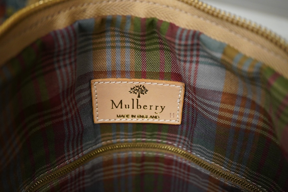 A Mulberry tartan canvas golf case, holdall and umbrella